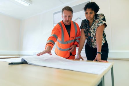 Voltzy project manager talking with client